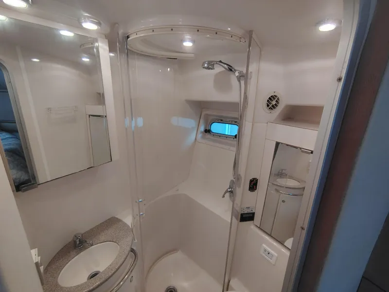 Slide: The Image of Bathroom interior of 1997 Bayliner 4085 Avanti yacht, featuring shower and sink. - 43