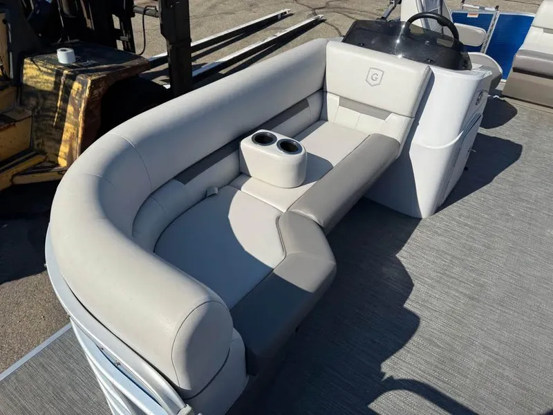 Slide: The Image of 2020 Godfrey Sweetwater 2086 CX pontoon boat interior with plush seating and cup holders. - 5