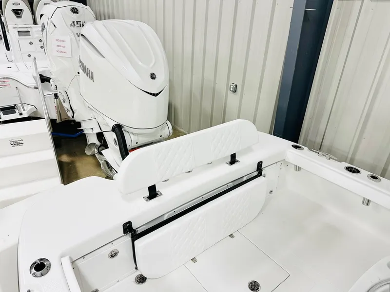 Slide: The Image of 2026 BlackJack Blackjack 256 Coastal boat with Yamaha outboard motor in showroom. - 16