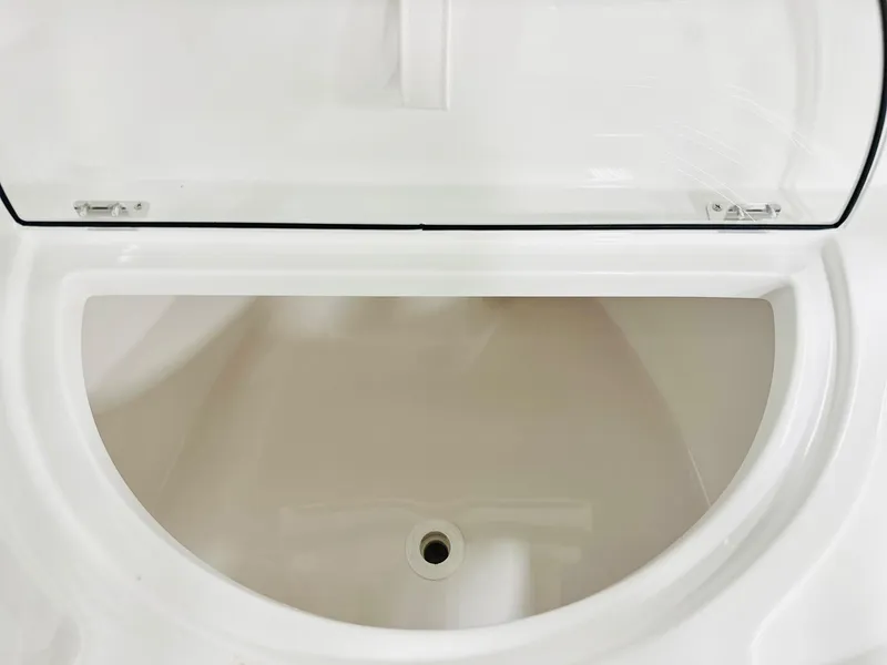 Slide: The Image of 2026 BlackJack Blackjack 256 Coastal boat storage compartment, open and empty. - 6