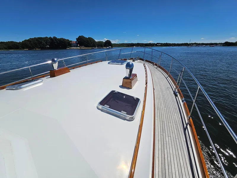 Slide: The Image of 2002 Grand Banks 49 Eastbay HX yacht deck with scenic water view. - 17
