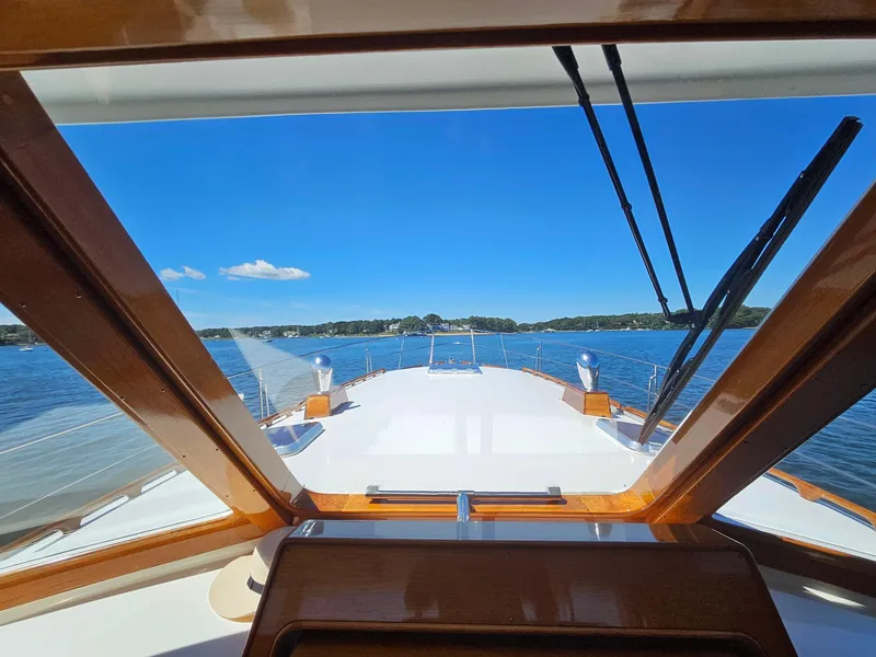Slide: The Image of View from the helm of a 2002 Grand Banks 49 Eastbay HX yacht on a sunny day. - 34