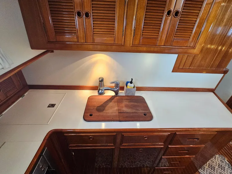 Slide: The Image of Luxurious wooden kitchen interior of 2002 Grand Banks 49 Eastbay HX yacht. - 39