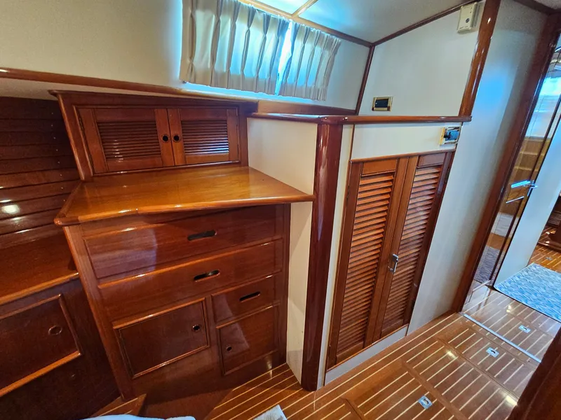 Slide: The Image of Luxurious wooden interior of 2002 Grand Banks 49 Eastbay HX yacht cabin. - 46