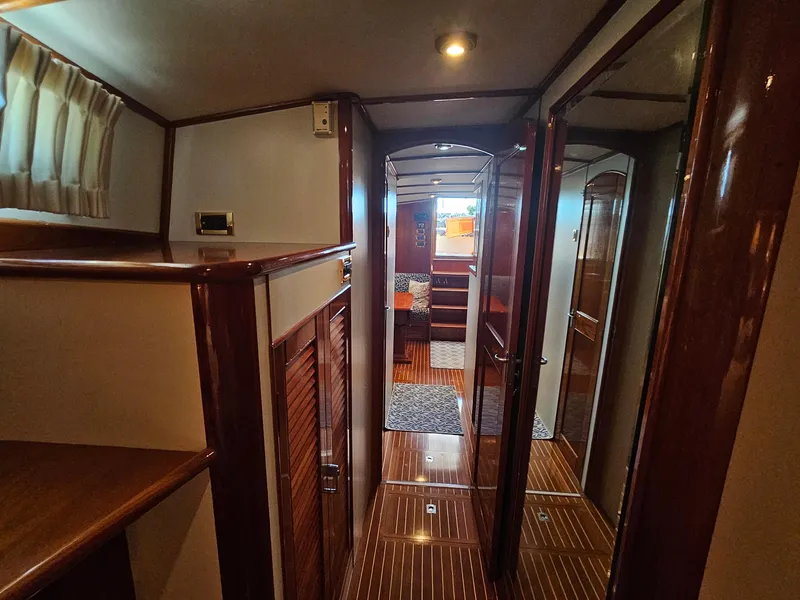 Slide: The Image of Luxurious interior of 2002 Grand Banks 49 Eastbay HX yacht with polished wood finishes. - 47
