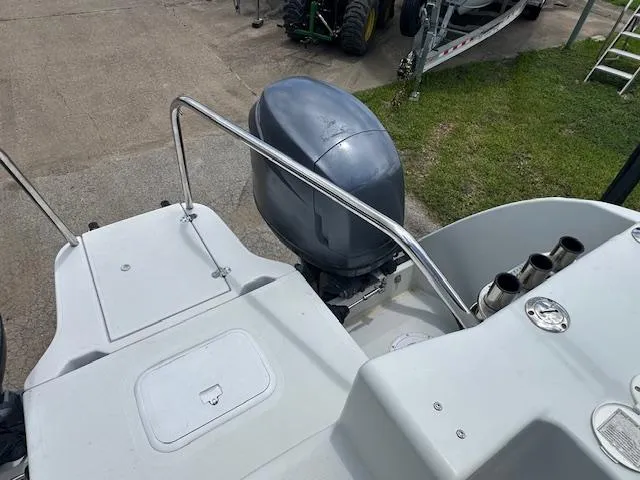 Slide: The Image of 2006 Glacier Bay 2240 SX Renegade boat with outboard motor and deck railing. - 10