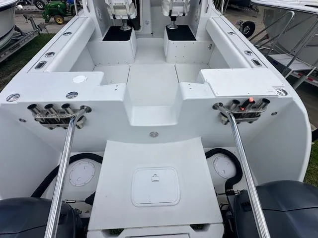 Slide: The Image of 2006 Glacier Bay 2240 SX Renegade boat interior with dual seating and engine controls. - 14