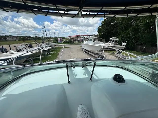 Slide: The Image of 2006 Glacier Bay 2240 SX Renegade boat view from cockpit, surrounded by other boats. - 15