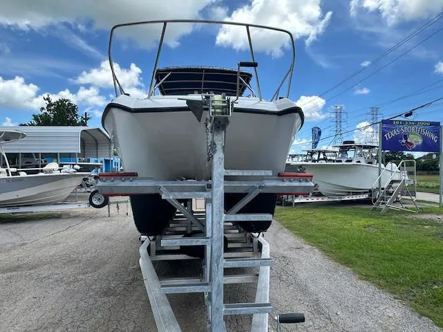 Slide: The Image of 2006 Glacier Bay 2240 SX Renegade boat on trailer at Texas Sportfishing dealership. - 19