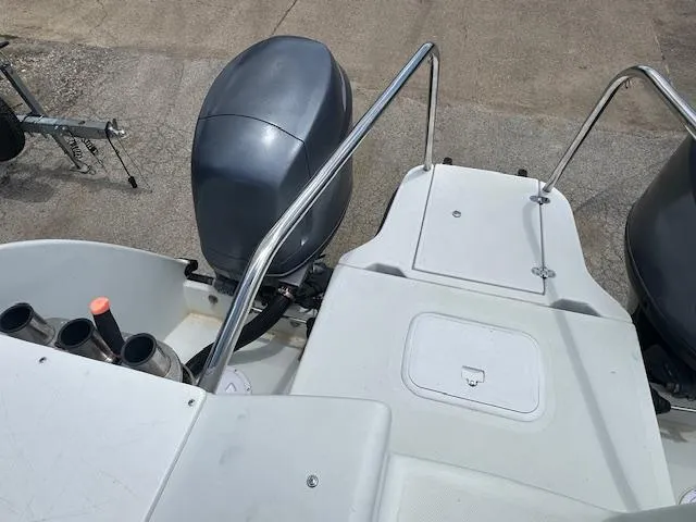 Slide: The Image of 2006 Glacier Bay 2240 SX Renegade boat with dual outboard motors and deck view. - 9