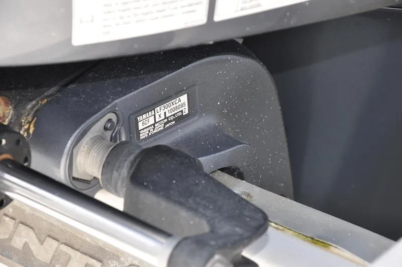 Slide: The Image of Close-up of Yamaha engine part on 2015 Sea Hunt Gamefish 30 boat. - 36