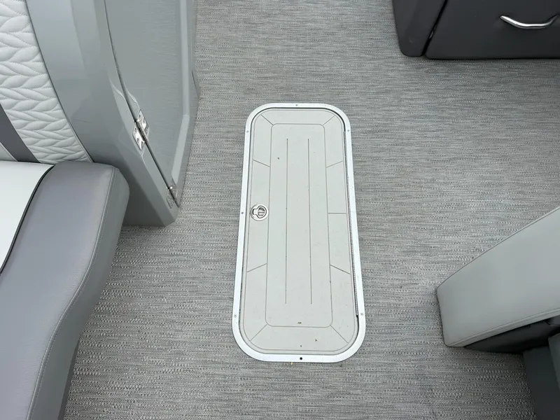 Slide: The Image of Interior of 2021 Godfrey Monaco 215 C boat showing floor hatch and seating. - 14