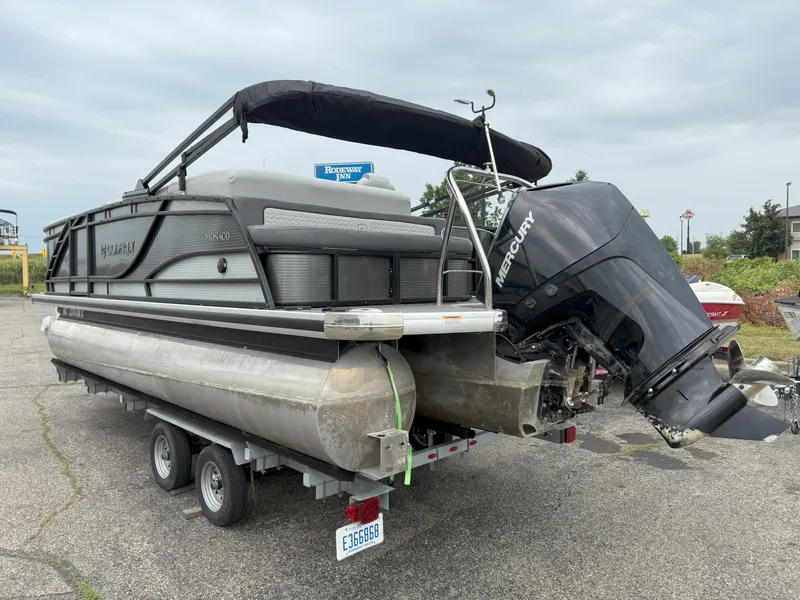 Slide: The Image of 2021 Godfrey Monaco 215 C pontoon boat with Mercury outboard motor on trailer. - 4