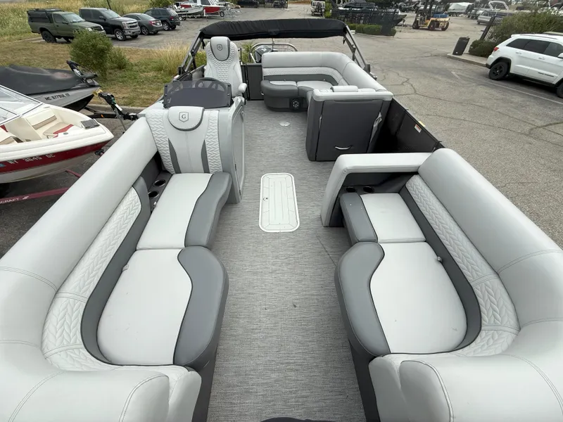 Slide: The Image of 2021 Godfrey Monaco 215 C pontoon boat with spacious seating and modern design. - 6