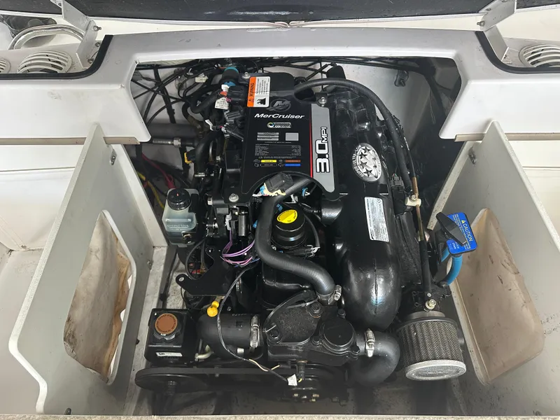 Slide: The Image of Engine compartment of a 2011 Four Winns H180 boat with MerCruiser 3.0 MPI engine. - 3