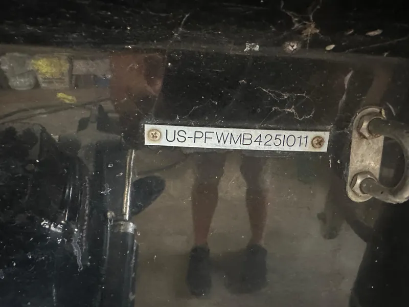 Slide: The Image of 2011 Four Winns H180 boat hull identification number plate. - 9