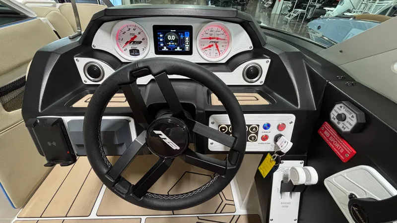 Slide: The Image of 2025 MB B52 23 Classic boat dashboard with steering wheel and control panel. - 11