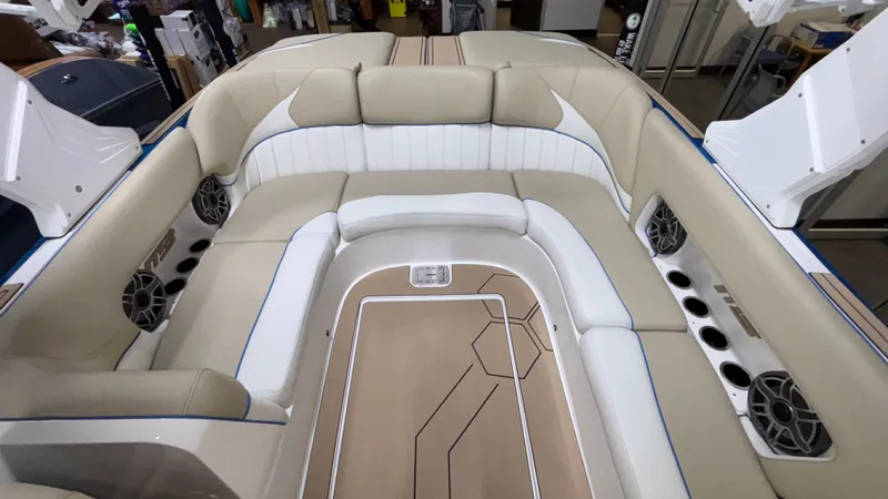 Slide: The Image of Luxurious interior of 2025 MB B52 23 Classic boat with beige and white seating. - 14