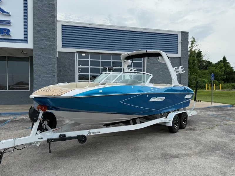 Slide: The Image of 2025 MB B52 23 Classic boat on trailer, parked outside dealership. - 3