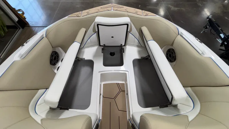 Slide: The Image of 2025 MB B52 23 Classic boat interior with beige seating and storage compartments. - 30