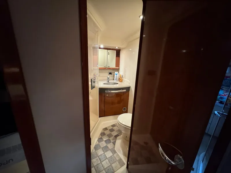 Slide: The Image of Cozy cabin interior of 2003 Sea Ray 500 Sundancer yacht with bunk beds. - 27