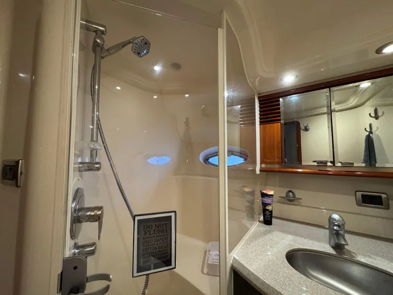 Slide: The Image of Luxurious bathroom in 2003 Sea Ray 500 Sundancer yacht with modern amenities. - 30