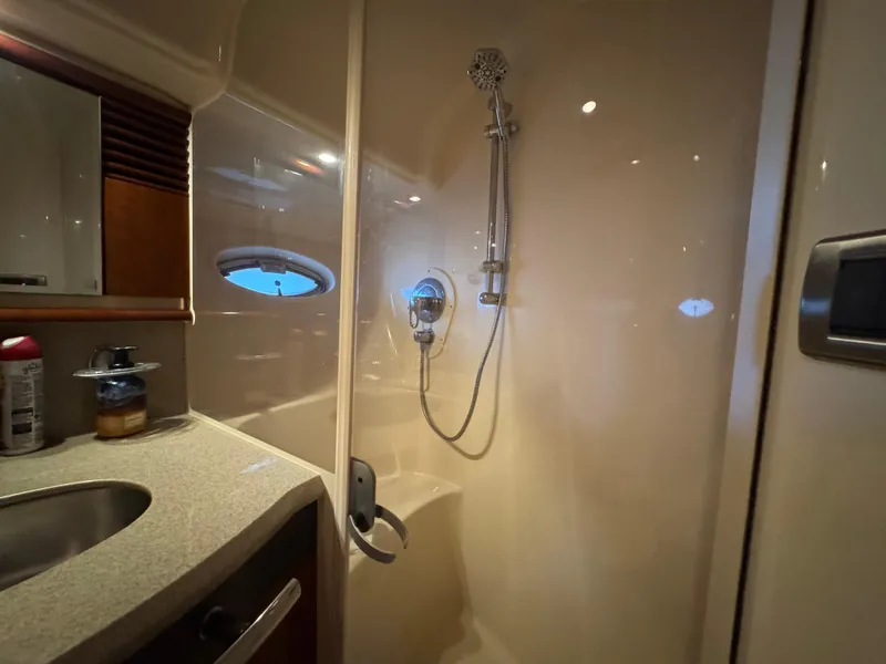 Slide: The Image of 2003 Sea Ray 500 Sundancer yacht bathroom with shower and sink. - 38