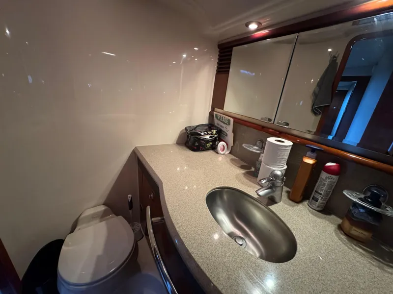 Slide: The Image of Luxurious bathroom in 2003 Sea Ray 500 Sundancer yacht with modern fixtures and shower. - 39