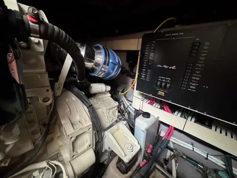 Slide: The Image of Engine compartment of a 2003 Sea Ray 500 Sundancer boat. - 49