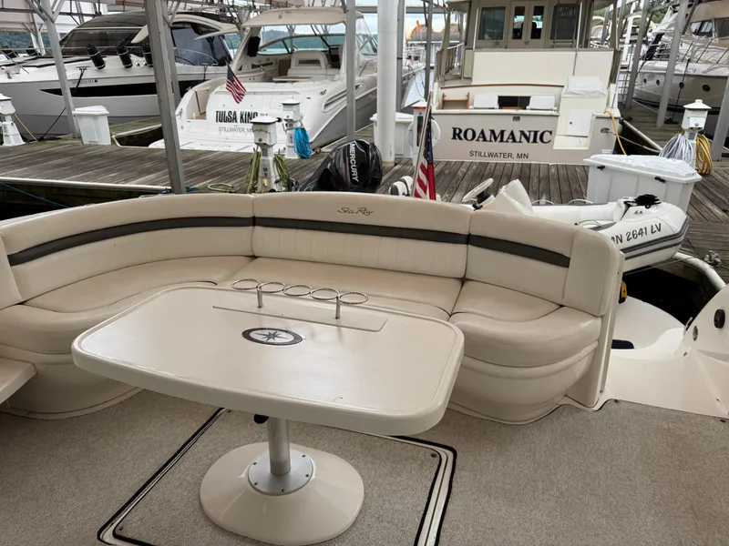 Slide: The Image of 2003 Sea Ray 500 Sundancer yacht docked under a canopy. - 7