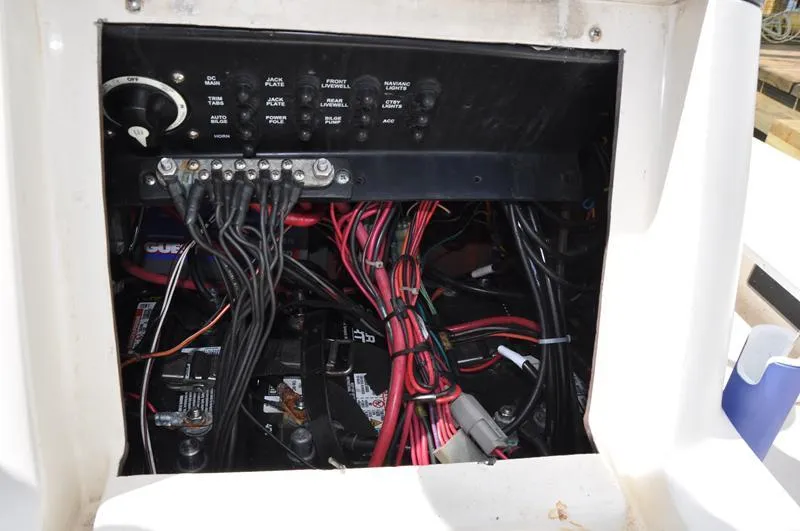 Slide: The Image of Electrical panel with wiring inside a 2008 Sterling 180TS boat. - 14