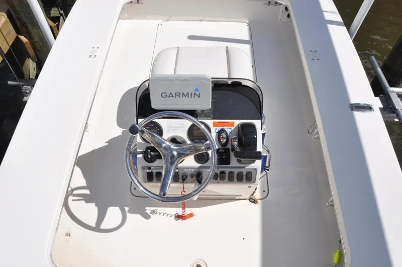 Slide: The Image of Sterling 180TS 2008 boat console with Garmin GPS, steering wheel, and controls. - 5