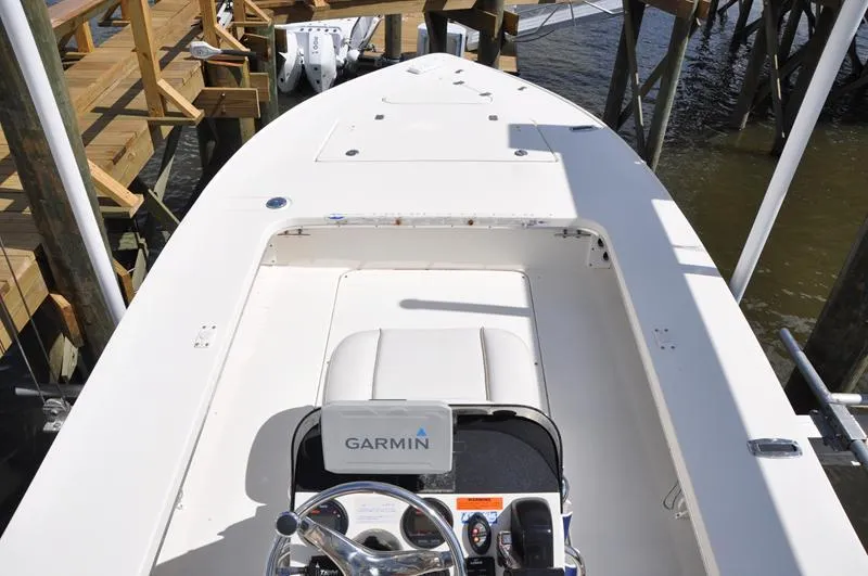 Slide: The Image of 2008 Sterling 180TS boat with Garmin navigation, docked by wooden pier. - 6
