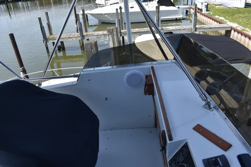 Slide: The Image of 1985 Marinette 39 Double Cabin boat interior with dock view. - 32