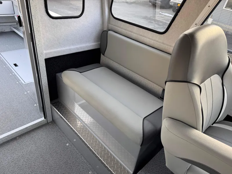 Slide: The Image of Interior of 2025 KingFisher 2825 Coastal Express, featuring sleek seating and modern design. - 8