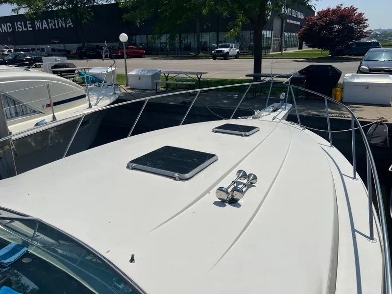 Slide: The Image of 1988 Wellcraft 3400 Grand Sport boat docked at Grand Isle Marina. - 4