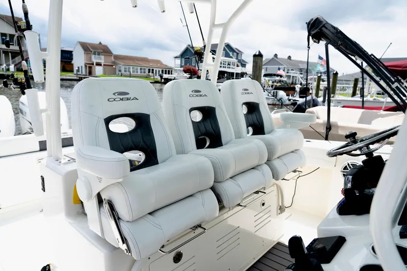 Slide: The Image of 2024 Cobia 350 boat interior with luxurious seating and modern design. - 7