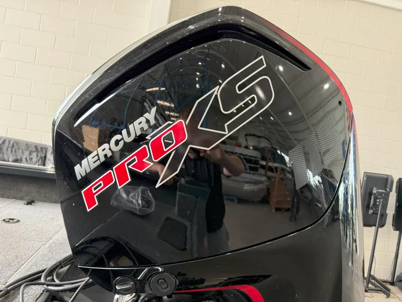 Slide: The Image of Mercury Pro XS engine on 2023 Ranger VS1682 WT boat, displayed indoors. - 12