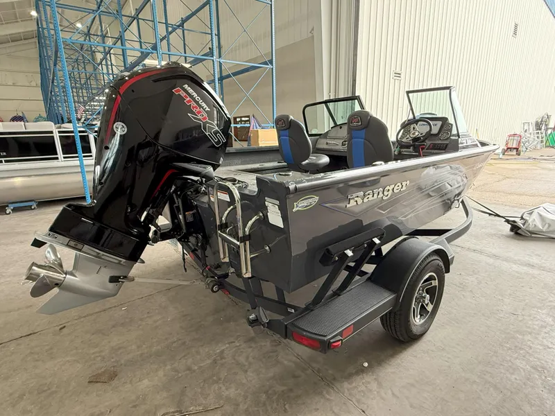 Slide: The Image of 2023 Ranger VS1682 WT boat with Mercury Pro XS engine in a warehouse setting. - 4