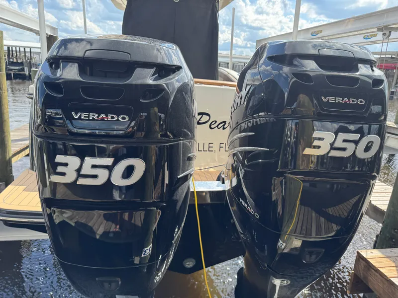 Slide: The Image of Twin Mercury Verado 350 engines on a 2021 Scout 330 LXF boat. - 48