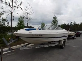 The Image of 2004 Mariah SK-10 boat on trailer in outdoor setting. - 1