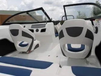 Slide: The Image of 2004 Mariah SK-10 boat interior with modern seating and dashboard design. - 9
