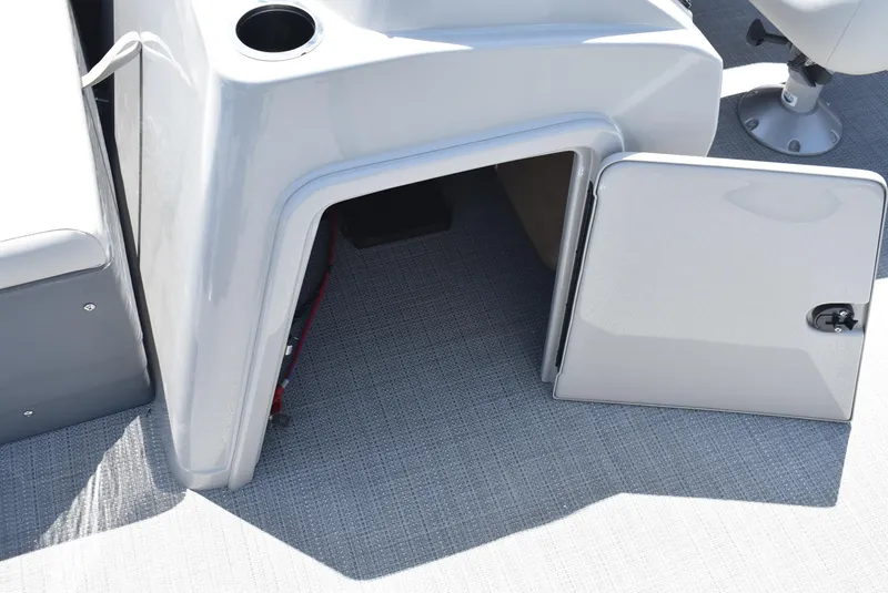 Slide: The Image of Open storage compartment on a 2024 SunChaser Geneva 20 Fish 4 pontoon boat. - 12