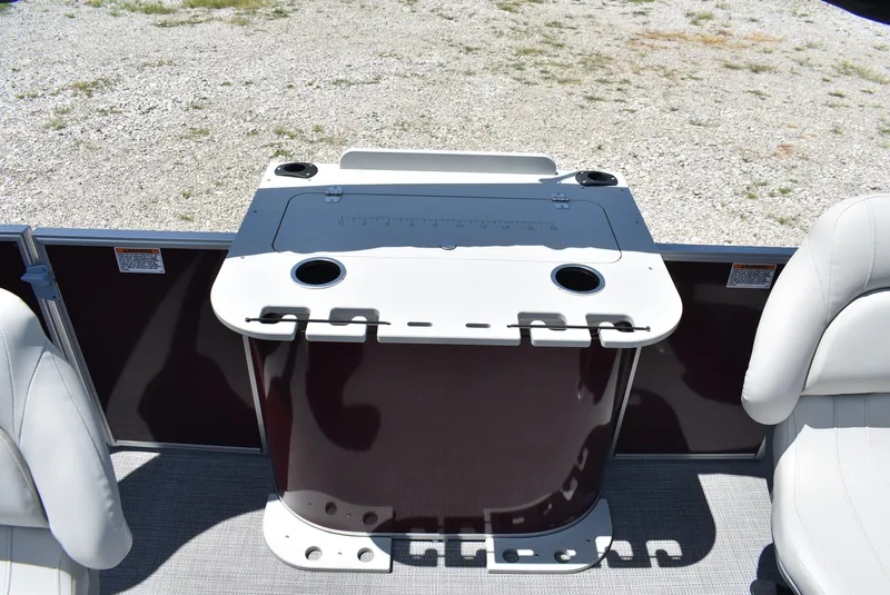 Slide: The Image of 2024 SunChaser Geneva 20 Fish 4 boat interior with fishing station and cup holders. - 6