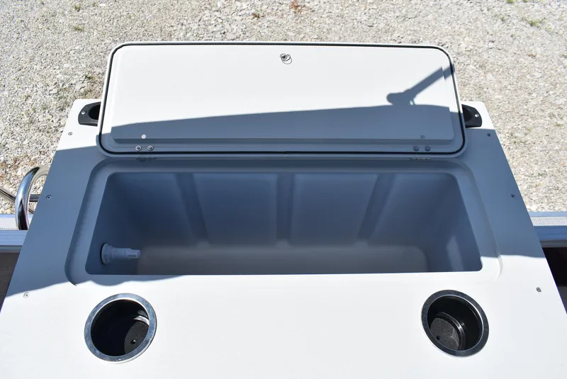 Slide: The Image of 2024 SunChaser Geneva 20 Fish 4 boat livewell with open lid and cup holders. - 7
