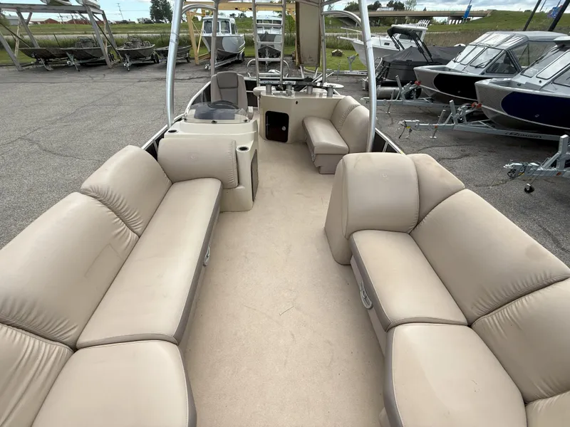 Slide: The Image of 2016 Sweetwater Premium Edition 240 SD pontoon boat with spacious seating and modern design. - 6