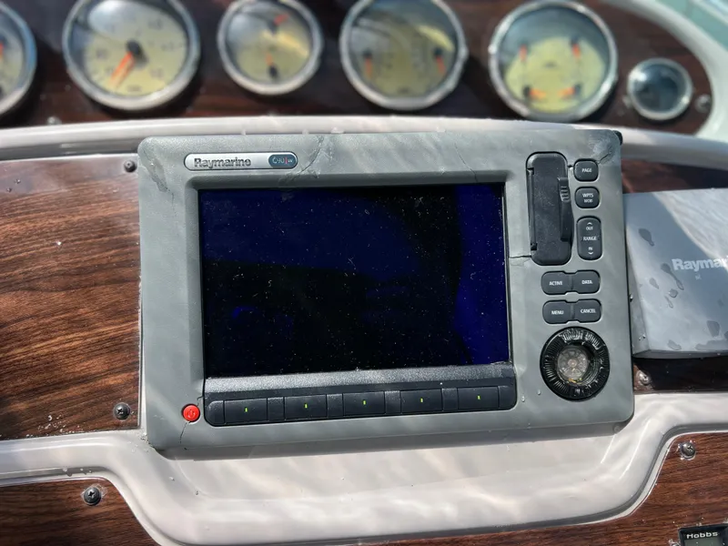 Slide: The Image of Dashboard of a 2005 Chaparral Signature 350 with Raymarine navigation system. - 24