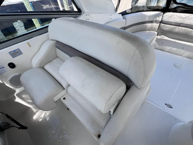 Slide: The Image of 2005 Chaparral Signature 350 boat interior with white leather seating and spacious layout. - 28