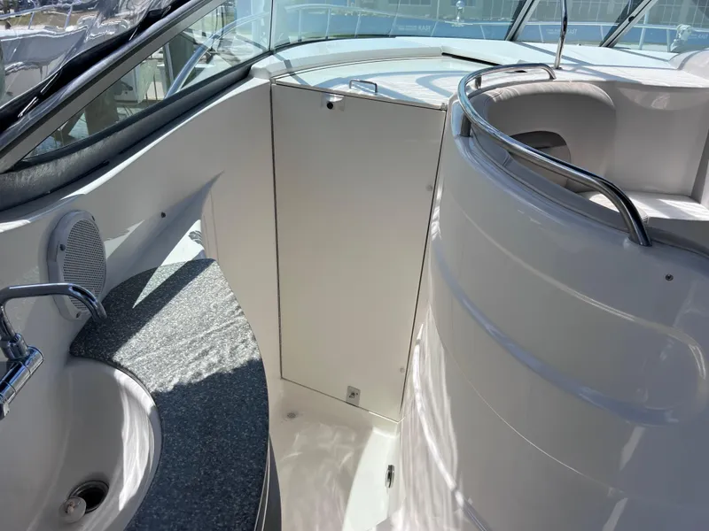 Slide: The Image of 2005 Chaparral Signature 350 yacht interior with sink and seating area. - 30