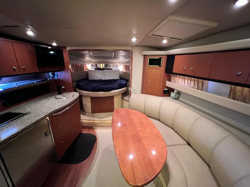 Slide: The Image of Luxurious interior of 2005 Chaparral Signature 350 yacht with cozy seating and modern amenities. - 34